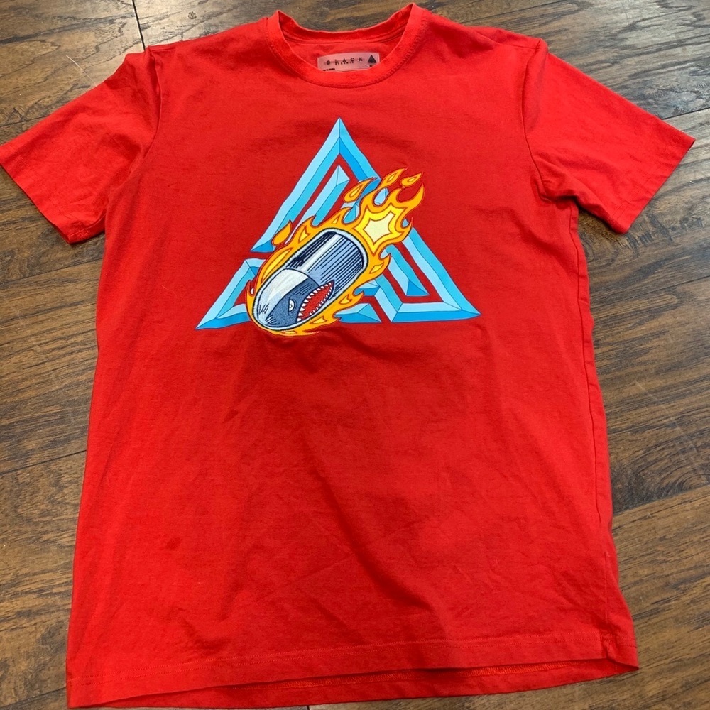 SOLD.  Black pyramid embroidered graphic Tee